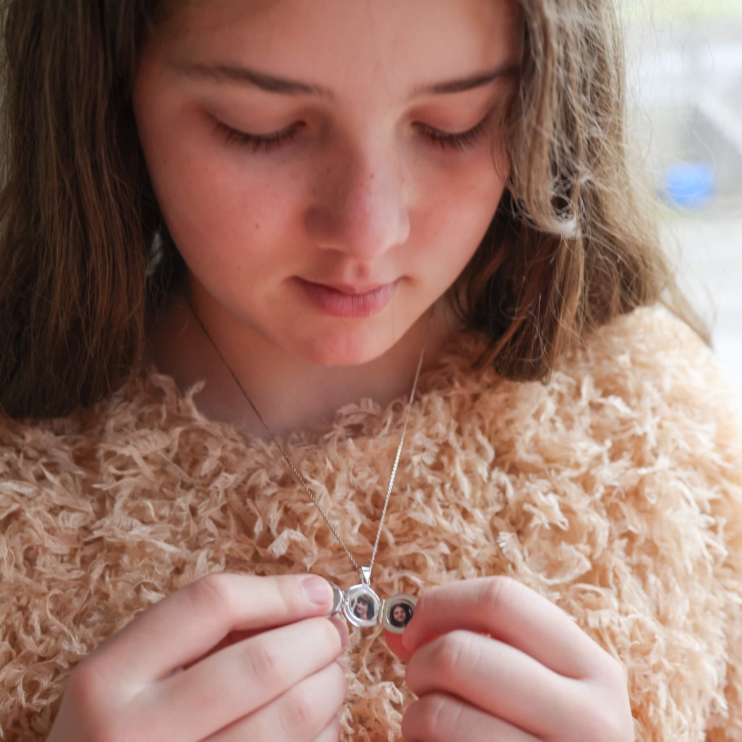 model wearing muti image photo locket