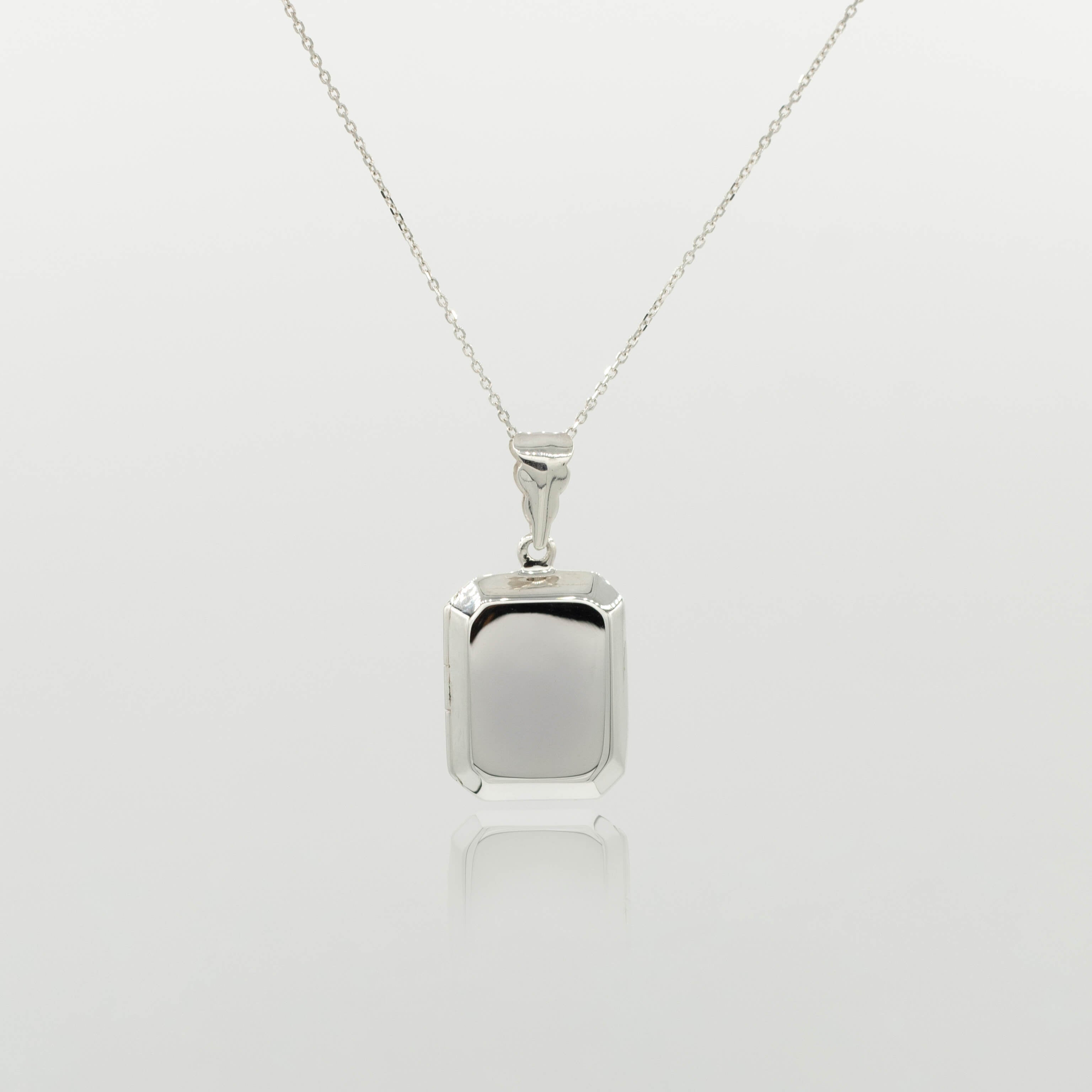 Sterling Silver Rectangular Locket complete with photos inserted – The ...