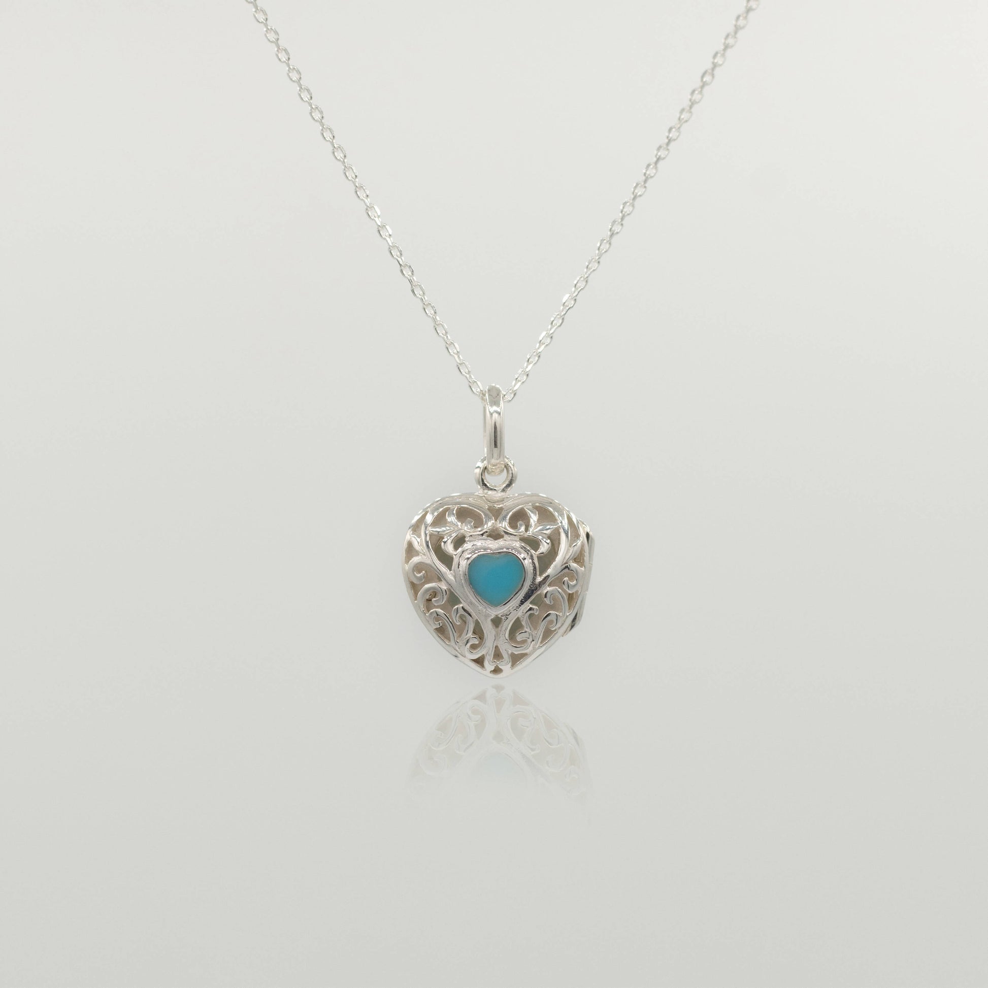 sterling silver heart locket with blue heart
