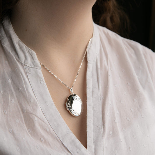 Model wearing a sterling silver photo locket