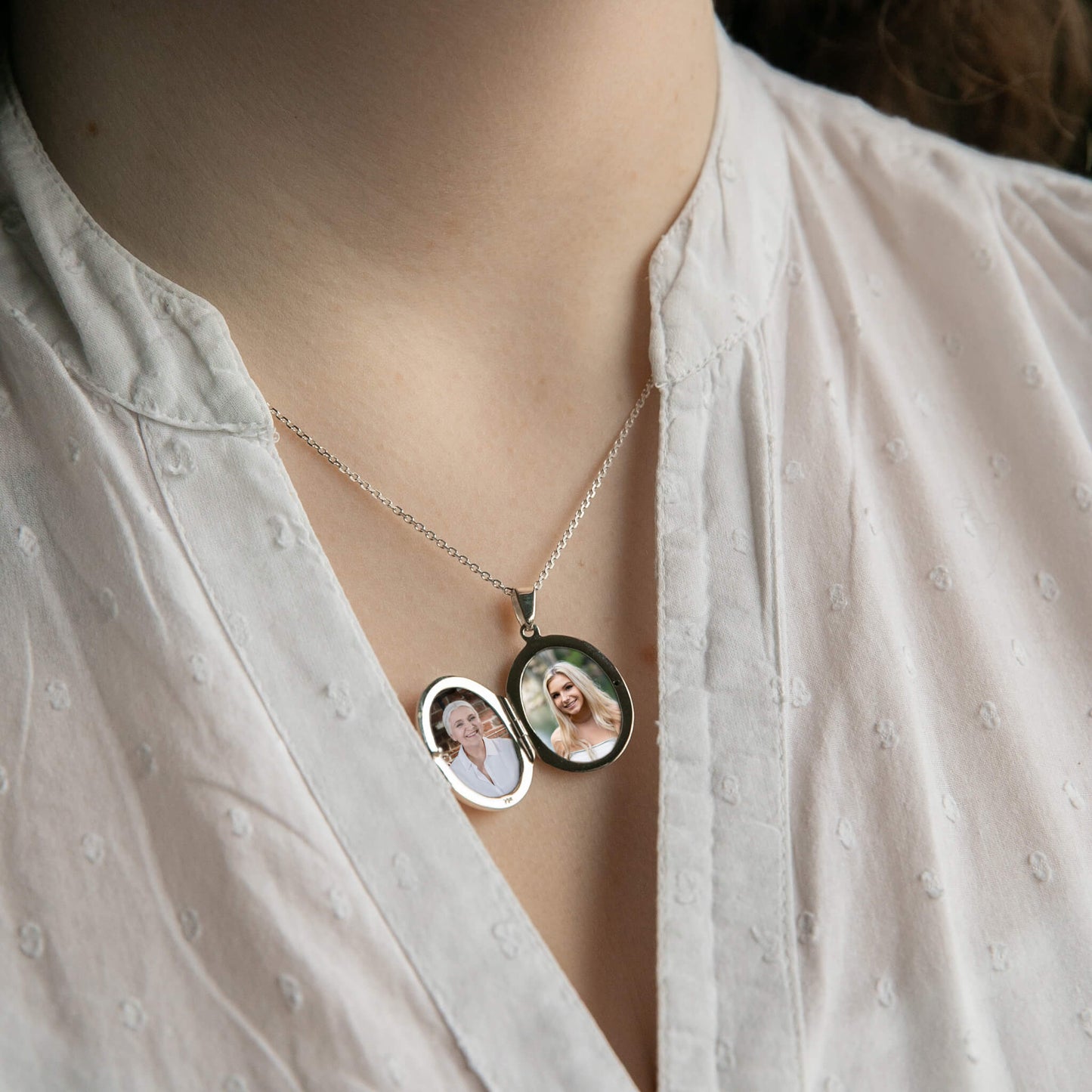 model wearing oval silver open locket