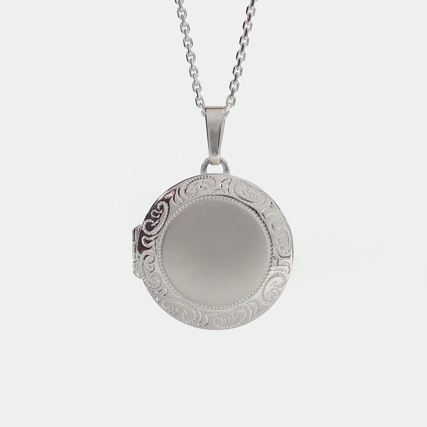 round photo locket on a white background