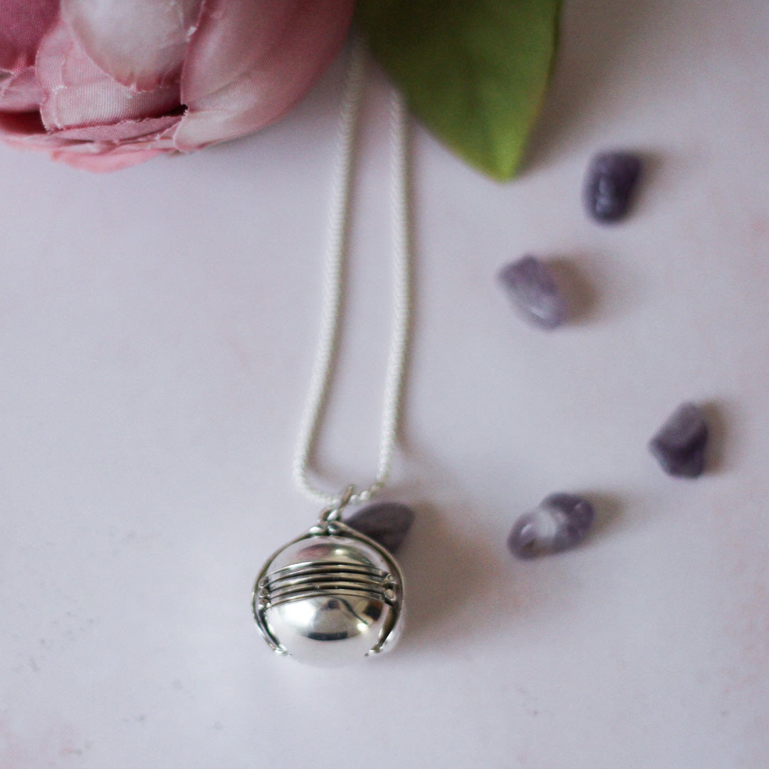 sphere shaped multi photo locket