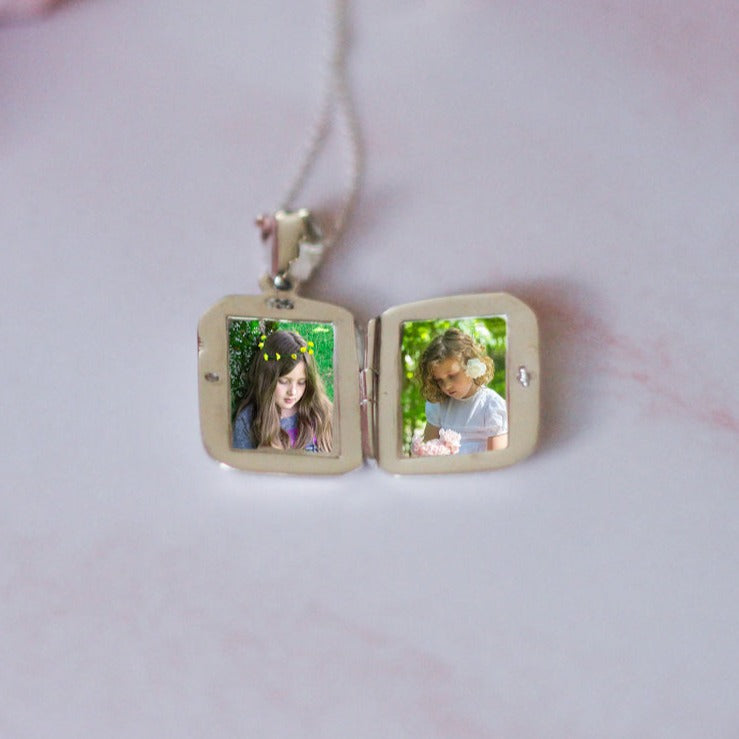 Rectangular shaped photo locket necklace with pictures inside